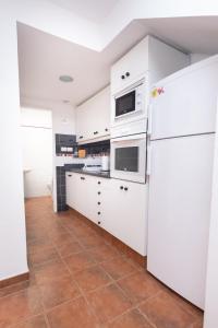 Kuchyň nebo kuchyňský kout v ubytování Duplex Sun and Sea + 3 fotografie