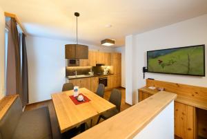 Kuchyň nebo kuchyňský kout v ubytování Appartement-Pension Kendlbacher