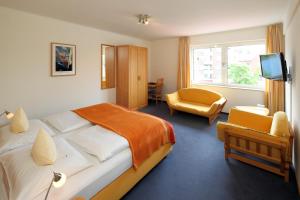 Postel nebo postele na pokoji v ubytování Hotel Am Segelhafen