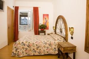 Postel nebo postele na pokoji v ubytování B&B Il Sedile