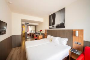 Voodi või voodid majutusasutuse Maisonnave toas
