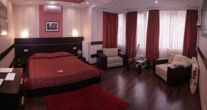 Postel nebo postele na pokoji v ubytování Viva Hotel