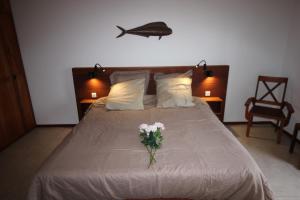 Voodi või voodid majutusasutuse Hotel Casa Evora - luxury and beach front toas
