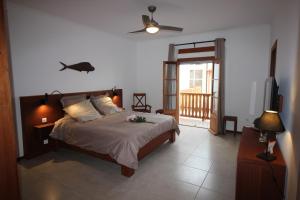 Voodi või voodid majutusasutuse Hotel Casa Evora - luxury and beach front toas