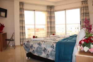 Postel nebo postele na pokoji v ubytování Hotel La Place