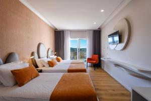 Postel nebo postele na pokoji v ubytování Hotel Rosa Mística by Umbral