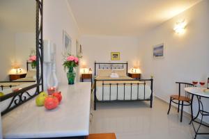 Postel nebo postele na pokoji v ubytování Hotel Nazos
