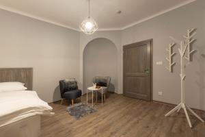 Voodi või voodid majutusasutuse Hotel pod Kapličkou toas