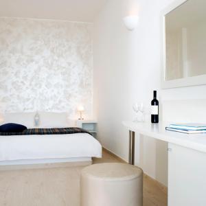 Postel nebo postele na pokoji v ubytování Tzekos Villas