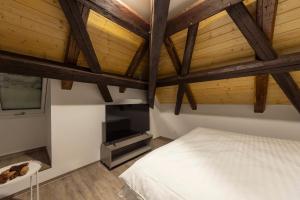 Voodi või voodid majutusasutuse Hotel pod Kapličkou toas