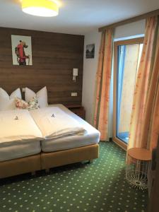 Posteľ alebo postele v izbe v ubytovaní Nonas B&B