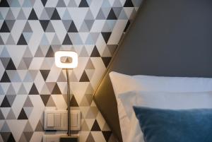 Postel nebo postele na pokoji v ubytování Hotel Rosa Mística by Umbral