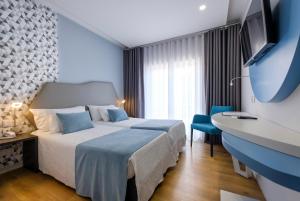 Postel nebo postele na pokoji v ubytování Hotel Rosa Mística by Umbral