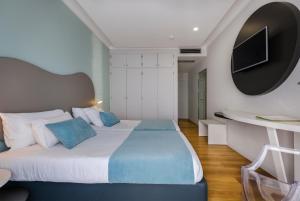 Postel nebo postele na pokoji v ubytování Hotel Rosa Mística by Umbral