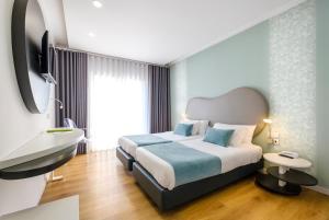 Postel nebo postele na pokoji v ubytování Hotel Rosa Mística by Umbral