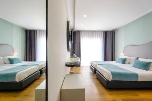 Postel nebo postele na pokoji v ubytování Hotel Rosa Mística by Umbral