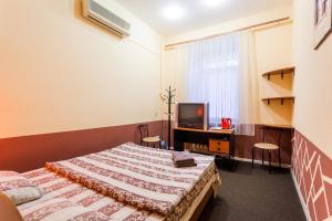 Postel nebo postele na pokoji v ubytování Mini-hotel in the heart of Kiev