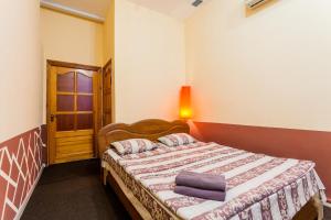 Postel nebo postele na pokoji v ubytování Mini-hotel in the heart of Kiev