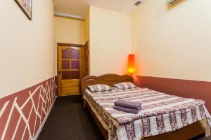 Postel nebo postele na pokoji v ubytování Mini-hotel in the heart of Kiev