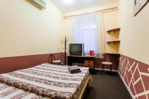 Postel nebo postele na pokoji v ubytování Mini-hotel in the heart of Kiev