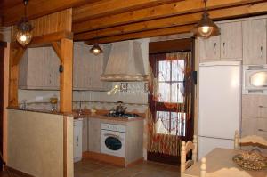 Kuchyň nebo kuchyňský kout v ubytování El Algarrobo by CasaTuristica