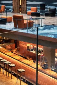 a view of a stage with chairs and tables at Hotel Warszawa in Warsaw