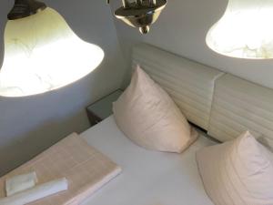 Postel nebo postele na pokoji v ubytování Hotel Restaurant Memo