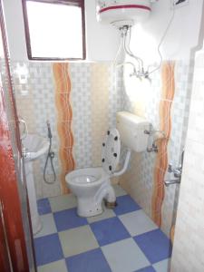Ett badrum på Alamdar guest house