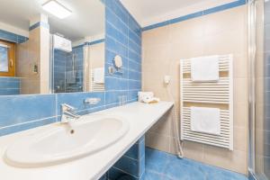Koupelna v ubytování Hotel Kaskáda