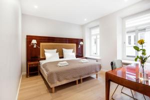 Lova arba lovos apgyvendinimo įstaigoje Jolly apartments by Reside Baltic