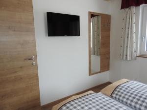 Postel nebo postele na pokoji v ubytování Bergschlössl