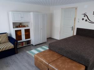Posezení v ubytování Csóka Apartman Pápa