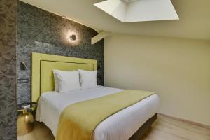 Villa Erizio, a bucolic and urban break客房内的一张或多张床位