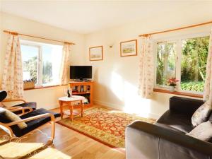 A seating area at Whispering Pines Cottage