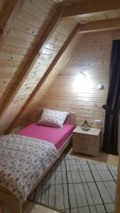 Postel nebo postele na pokoji v ubytování Vile Stefan