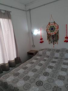 Ένα ή περισσότερα κρεβάτια σε δωμάτιο στο El Vagón