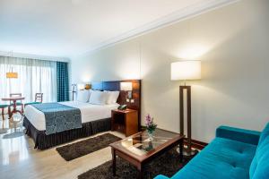 Letto o letti in una camera di Hotel Dann Carlton Bucaramanga