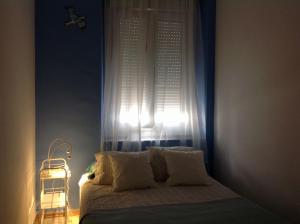 Posteľ alebo postele v izbe v ubytovaní La casa del dibujante
