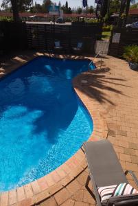 Bazén v ubytování Tuncurry Motor Lodge nebo v jeho okolí
