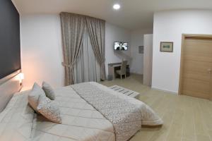 Posteľ alebo postele v izbe v ubytovaní Bed And Breakfast Garibaldi54
