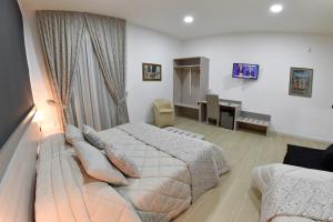 Posteľ alebo postele v izbe v ubytovaní Bed And Breakfast Garibaldi54