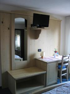 Postel nebo postele na pokoji v ubytování Hotel Negritella