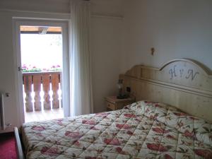 Postel nebo postele na pokoji v ubytování Hotel Negritella