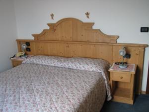 Posteľ alebo postele v izbe v ubytovaní Hotel Negritella