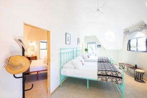 Postel nebo postele na pokoji v ubytování Villa San Ignacio + 37 fotografií