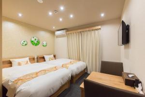 Lova arba lovos apgyvendinimo įstaigoje Stay SAKURA Kyoto Higashiyama Shirakawa