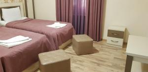 Postel nebo postele na pokoji v ubytování B&B Europa Hotel