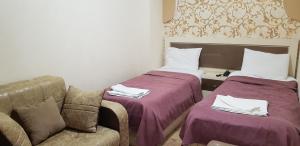 Postel nebo postele na pokoji v ubytování B&B Europa Hotel