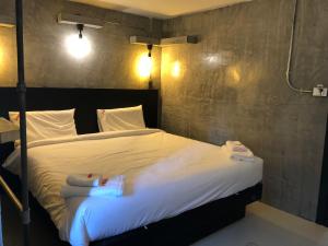 Postel nebo postele na pokoji v ubytování AVA Boutique Guesthouse