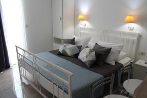 Posteľ alebo postele v izbe v ubytovaní Apartment Luna